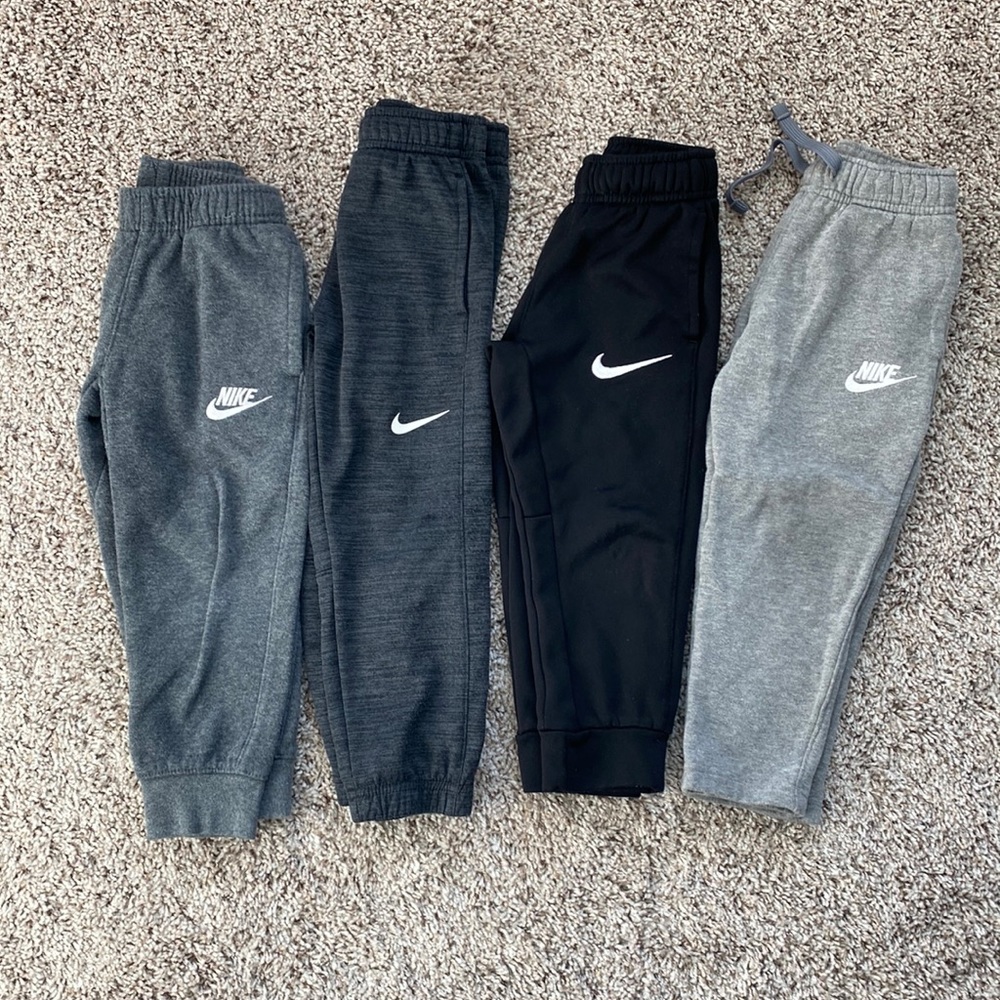 4 pairs of Nike pants